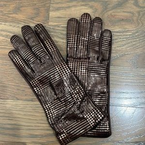 Gold and brown leather gloves